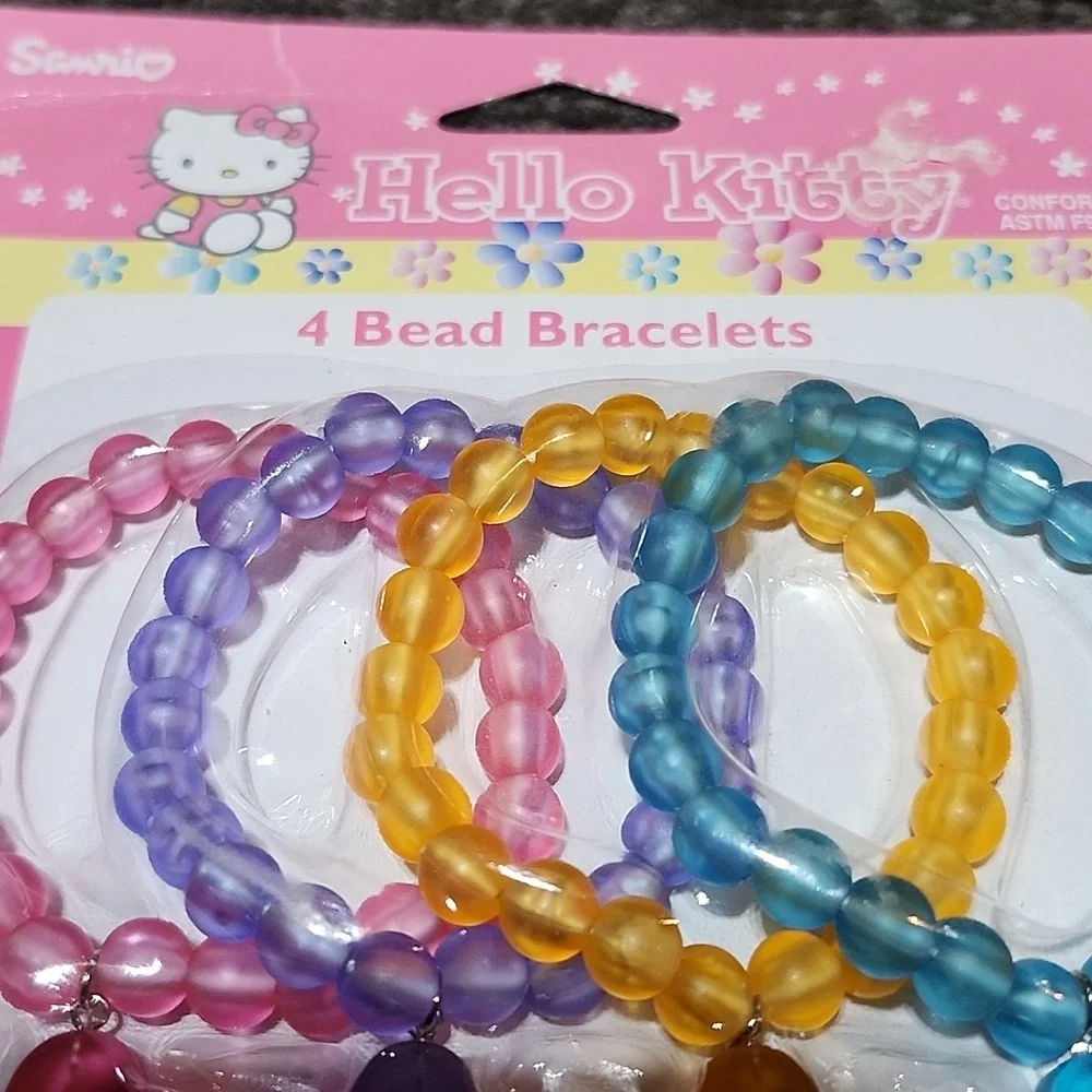 VINTAGE SANRIO 2001 HELLO KITTY 4-PIECE BEAD BRACELETS W/ STAR CHARMS SET